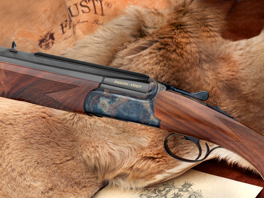 ITALYCO EXPRESS TIPO :SOVRAPPOSTO CALIBRO :8x57 Jrs, 9,3x74R, .30R Blaser, .30-06, .444 Marlin, .45-70 Us Government CANNE :60 BASCULA : BOX LOCK ROUND BODY - FINITURA ARGENTO VECCHIO O BONE CHARCHOAL - GUARDIA LUNGA MECCANISMO : MONOGRILLO NON SELETTIVO (A RICHIESTA BIGRILLO) - ESTRAZIONE AUTOMATICA (A RICHIESTA MANUALE) CALCIO : A PISTOLA CON COCCIA - IN NOCE (TIPO 4A) FINITO A OLIO - CALCIOLO IN GOMMA ASTA : INGLESE INCISIONE : MANUALE FIRMATA VALIGETTA : ABS VL 800 EX PREZZO: DA €URO 6.700,00 + IVA ( 7.500,00 + IVA nella versione SLX)